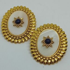 * vintage 1928 brand Mother of Pearl big gold tone clip on earrings